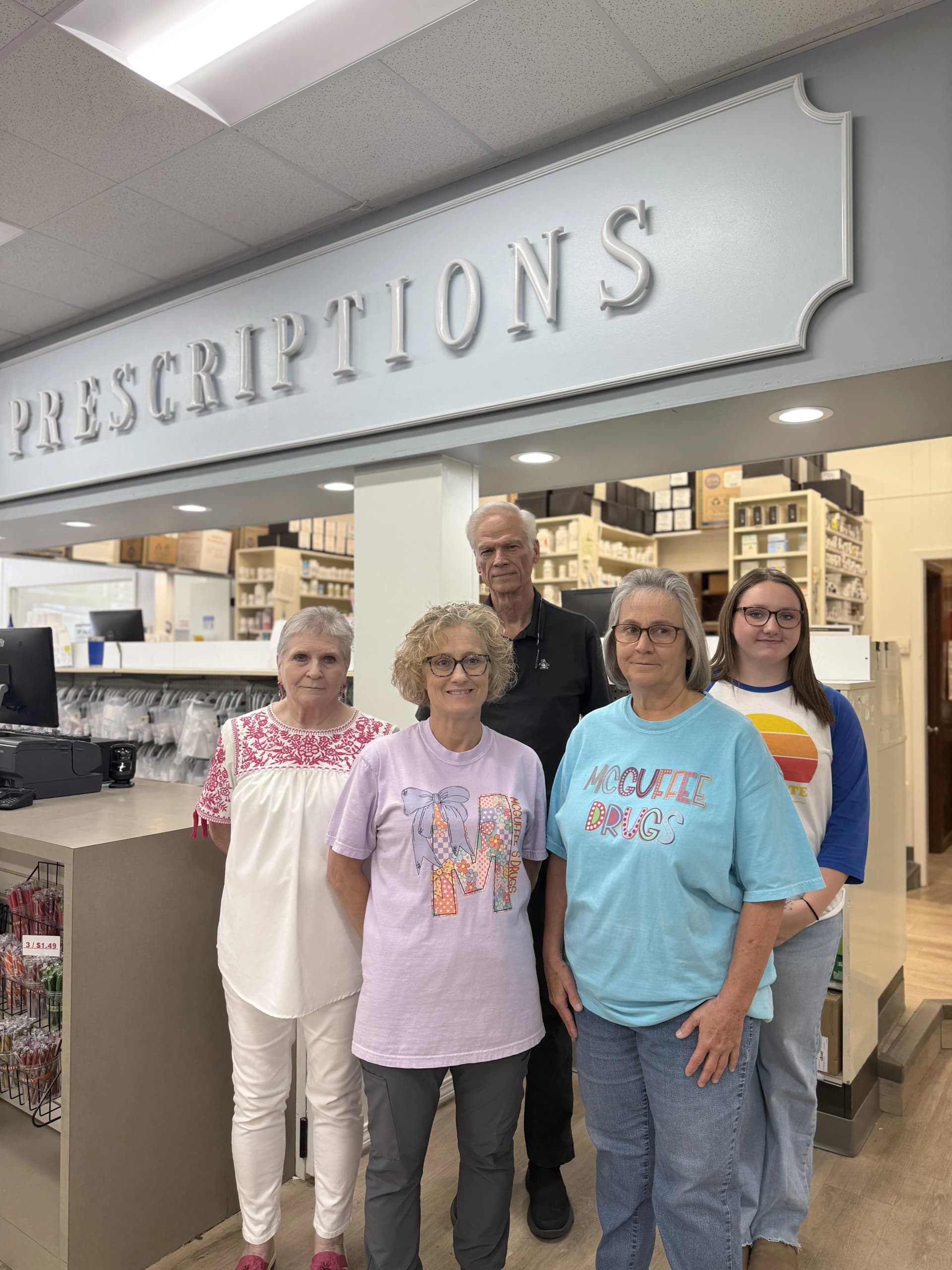 happy patient visiting McGuffee's Drug